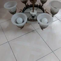 لوستر ۶ شاخه بدنه برنز و یک دیوارکوب