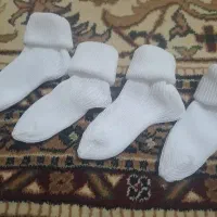 جوراب نوزادی تک رنگ
