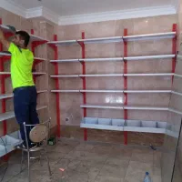 نصاب تجهیزات و قفسه فروشگاهی.صنعتی ،انباری.عطاری