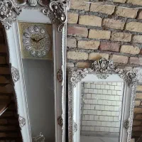 آینه وکنسول وساعت ایستاده