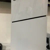دستگاه PS5 Slim 1 TB دودسته با شارژر بیسیم