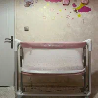 تخت بغل مادر برقی و موزیکال