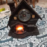 ساعت کلبه ای موزیک و شومینه دار