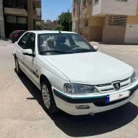 پژو پارس TU5 سفید چهار چرخ دیسک گاز سیمی