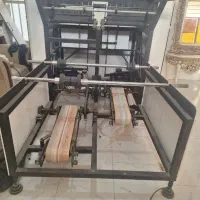 دستگاه رول کن سفره یکبار مصرف