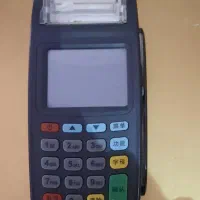 یک مودم ایرانسل متحرک و دستگاه پوز