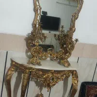 آینه شمعدان و ساعت