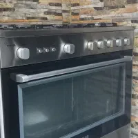 گاز ۵ شعله برند اسنوا با فر جوجه گردان