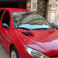 پژو 206 قرمز گوجه ای