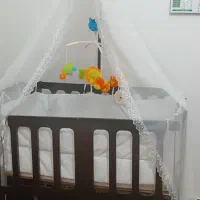 تخت کنار مادری