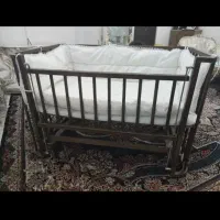 گهواره کنارتخته وکریر
