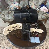 دستگاه فیزیوتراپی و ماشاژ