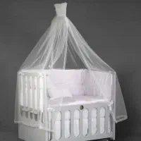 تخت کنار مادر و گهواره