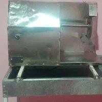 ترازو و مرغ خوردکن