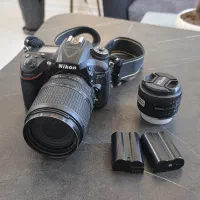 دوربین نیکون D7200 + دو لنز دوربین و سه باطری