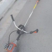 علف زن  بنزینی( علف تراش)
