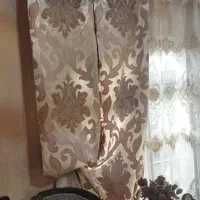 دوعددکتیبه کنار پرده