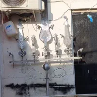 علم سه تیغ چوب بلند
