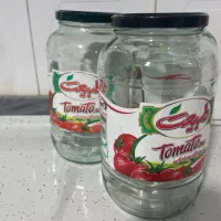 تعدادی شیشه رب دو و نیم کیلویی
