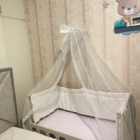 گهواره تخت کنار مادر