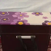 میز اتو چوبی نشسته