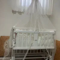گهواره کنار تخت مادر