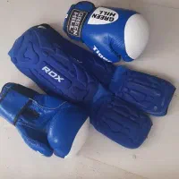 دستکش بوکس و ساق بند کیک بوکسrdx