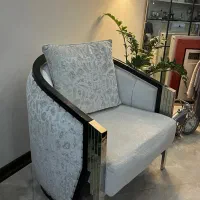 یک دست مبل چهار نفره استیل با جلو‌مبلی و میز تی وی