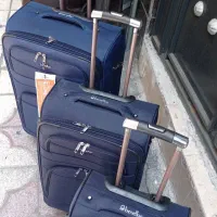 چمدان مسافرتی چهار چرخ با کاور