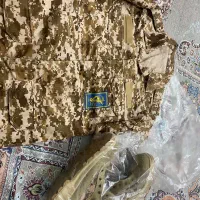 پوتین و لباس نظامی