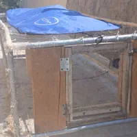 قفس مرغ به همراه دان خوری