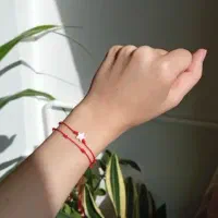 دستبند رد استرینگ (هفت گره)