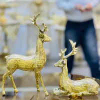 مجسمه و دکوری برنجی دهکده برنز