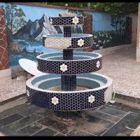 آب نما (فواره) و دلفین سنگی