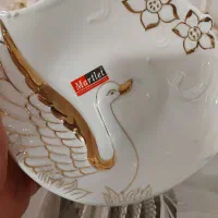 یک سرویس ۱۴پارچه   با طرح قو برجسته
