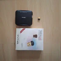 مودم adsl همراه با دانگل بیسیم تی پی لینک