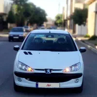 پژو 206 سفید مدل1399 بیرنگ شاسی پلمپ کم کار درحد