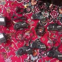تعدادی دسته سگا نیمه کار همراه با آداپتور