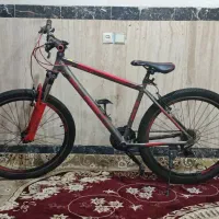 دوچرخه مدل بلست توسی و قرمز سایز 27،5 در حد نو