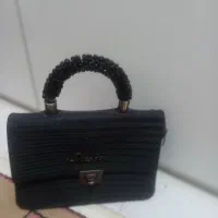 دوتا کیف|کیف، کفش، کمربند|نیشابور, مازول|دیوار