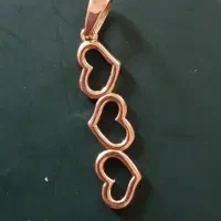 پلاک قلبی و گوشواره میخی