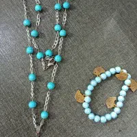 گردنبند مرغ آمین و ساعت جیبی