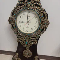 ساعت دیواری آونگ دار