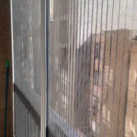 پنجره دوجداره upvc توری پلیسه و آلمینیومی