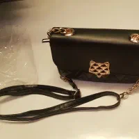 کیف مجلسی چرم مشکی نونو