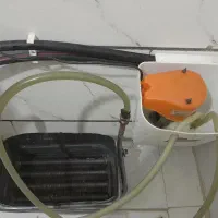 تعمیر اسید شوی آبگرمکن با دستگاه