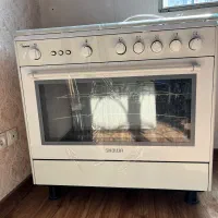 گاز فر اسنوا در حد نو و یخچال فریزر فیلور