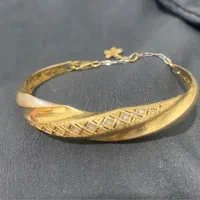 دستبندطلا النگویی وزن ۷ گرم ۹۰۰ سوت و نیم ست۱ گرم