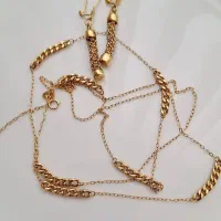 رولباسی و گوشواره طلا