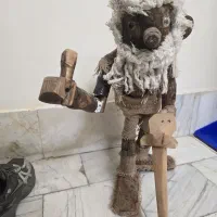 مجسمه چوبی کار دست